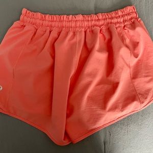 Lululemon “Track That” High-Rise Lined Short 3"
Size 6

Color: Pale Raspberry